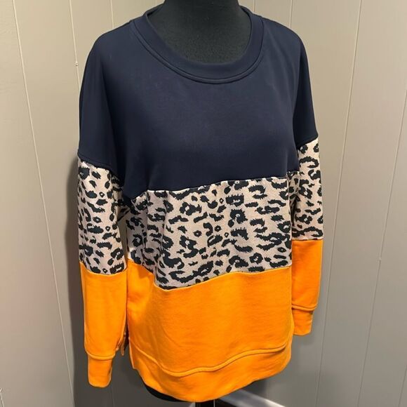 Colorblocked navy/animal print/orange crewneck long sleeve sweatshirt. Medium. - Picture 1 of 3